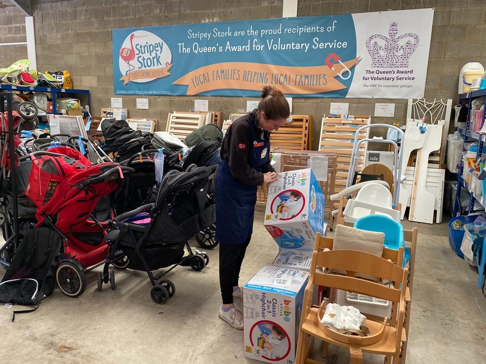 Woman standing checking baby supplies